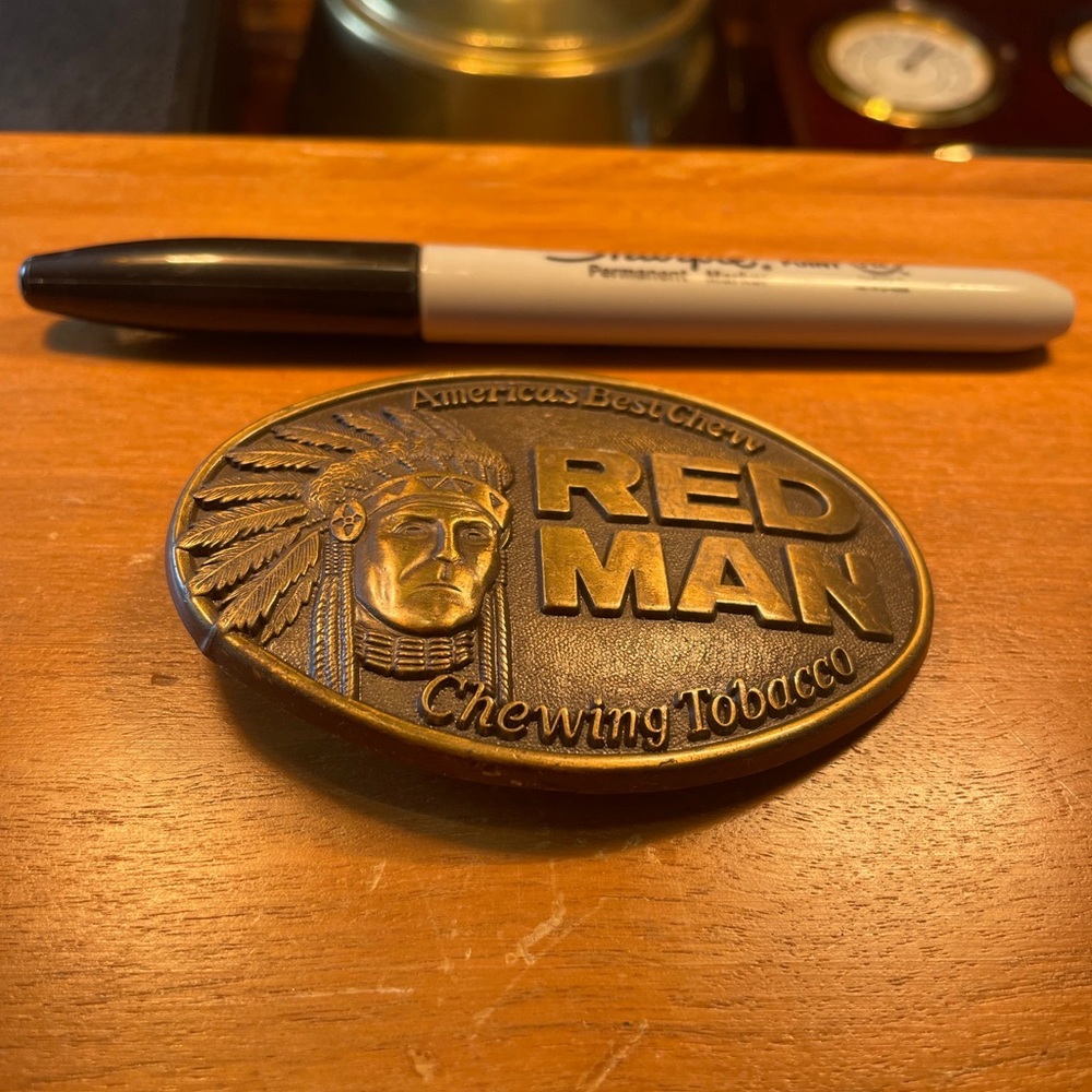 Red Man belt buckle